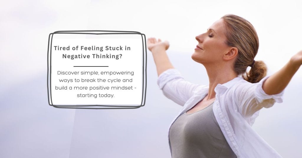 Woman standing outdoors with arms open, representing freedom from a negative mindset and the clarity gained through RTT® hypnotherapy