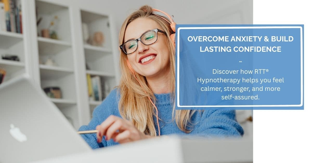 Smiling woman at a desk wearing headphones, feeling calm and confident while using RTT® Hypnotherapy techniques