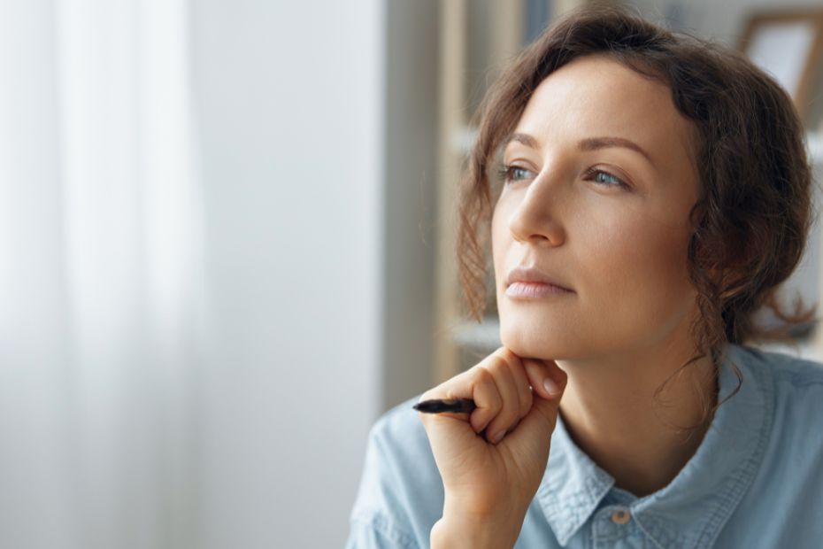 Professional woman identifying self-doubt patterns during RTT coaching