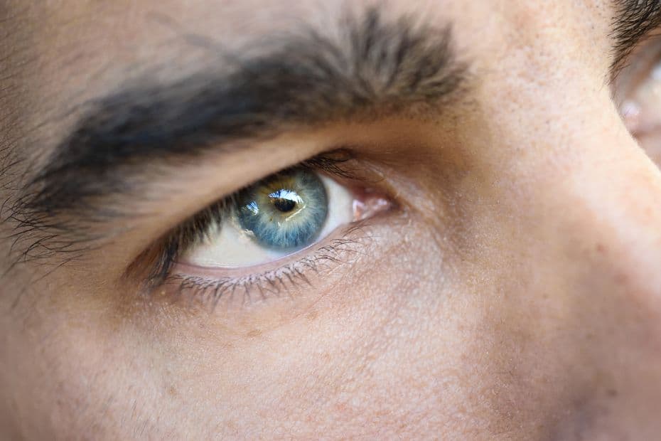 A person looking up with a calm, thoughtful expression, suggesting a moment of reflection and inner awareness.