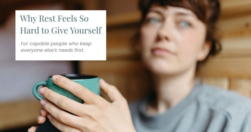 Woman sitting quietly holding a teal mug, reflecting on why rest and self-care feel hard to prioritise
